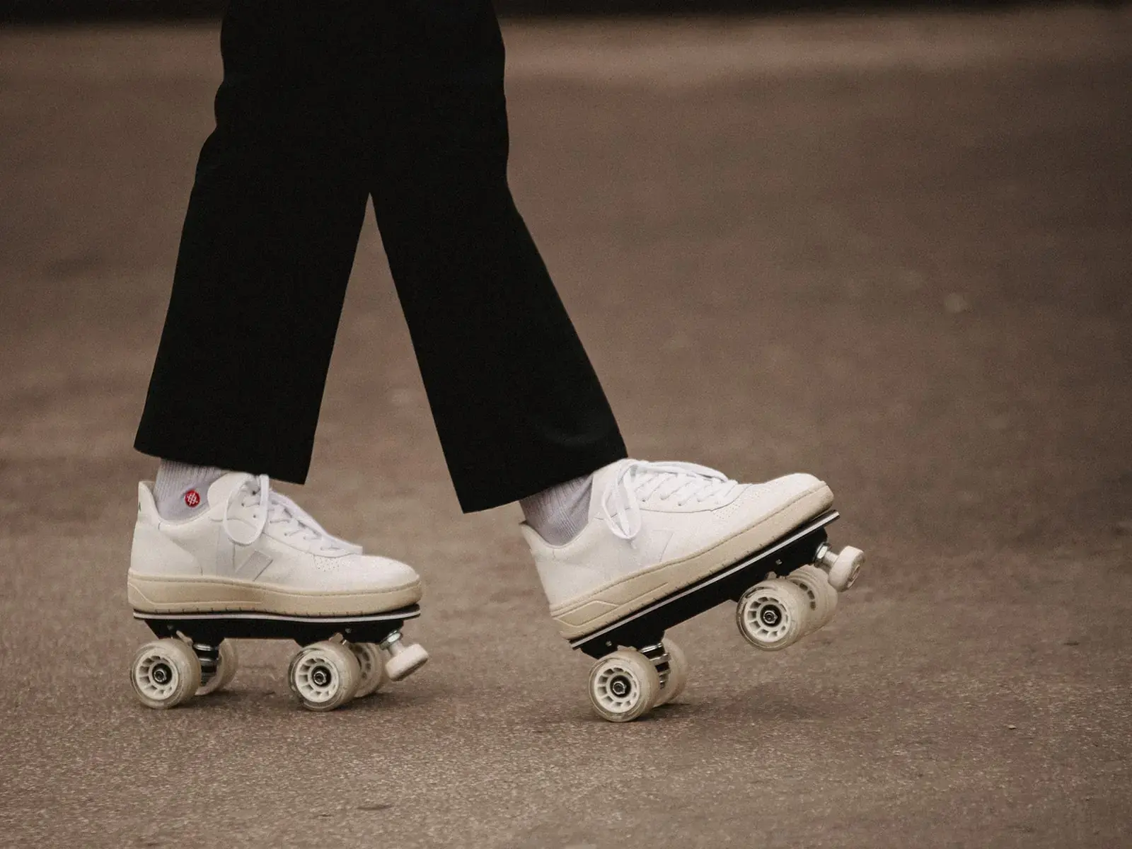 a man skating with his white veja transformed by flaneurz