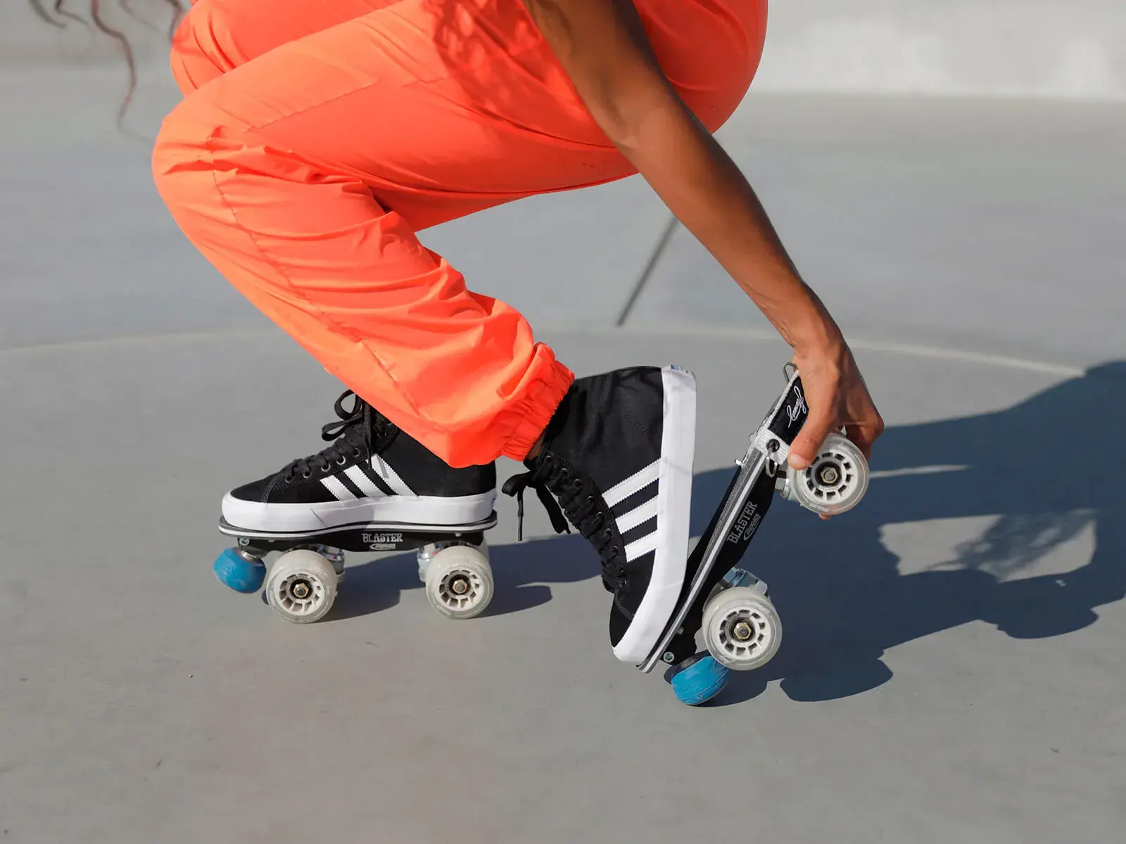 a boy wearing a black adidas transformed by flaneurz