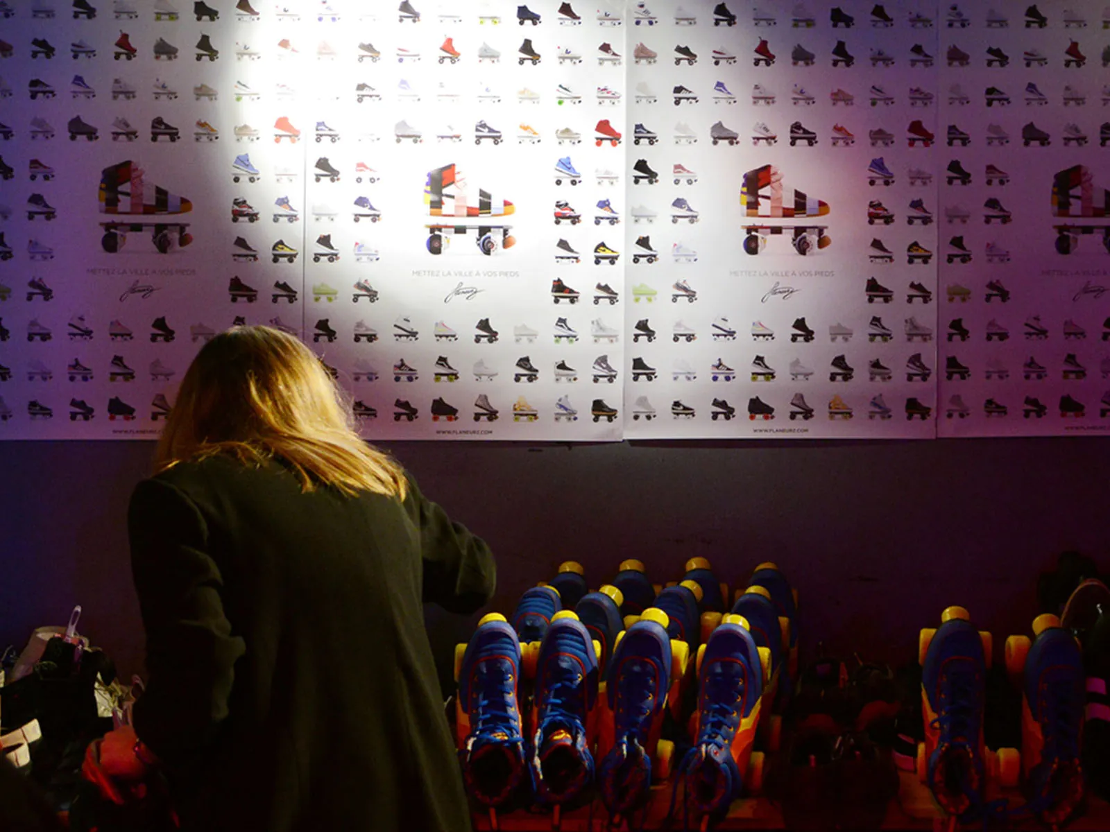 a woman choosing skating sneakers by flaneurz 