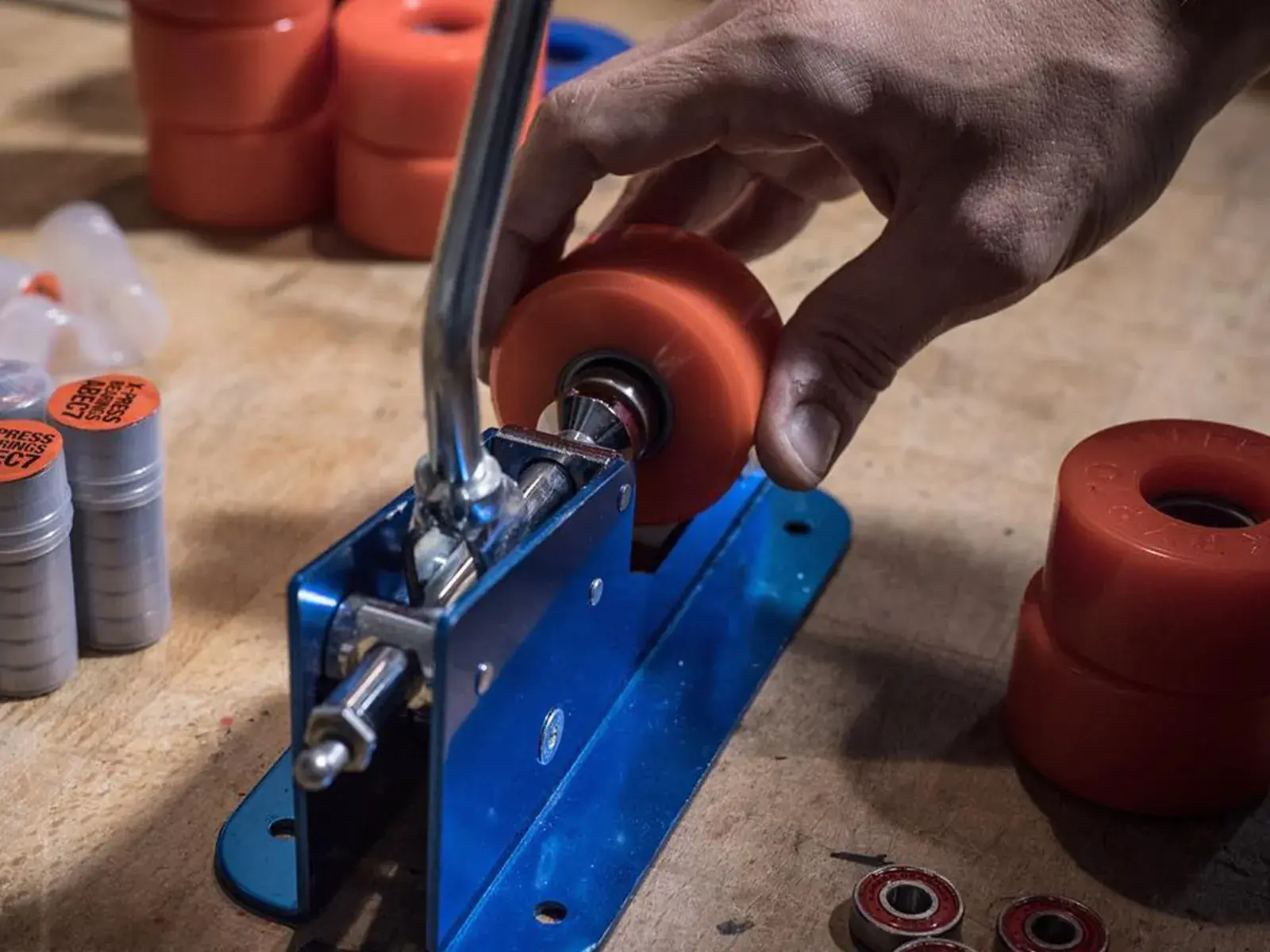 a man working on rollers wheels