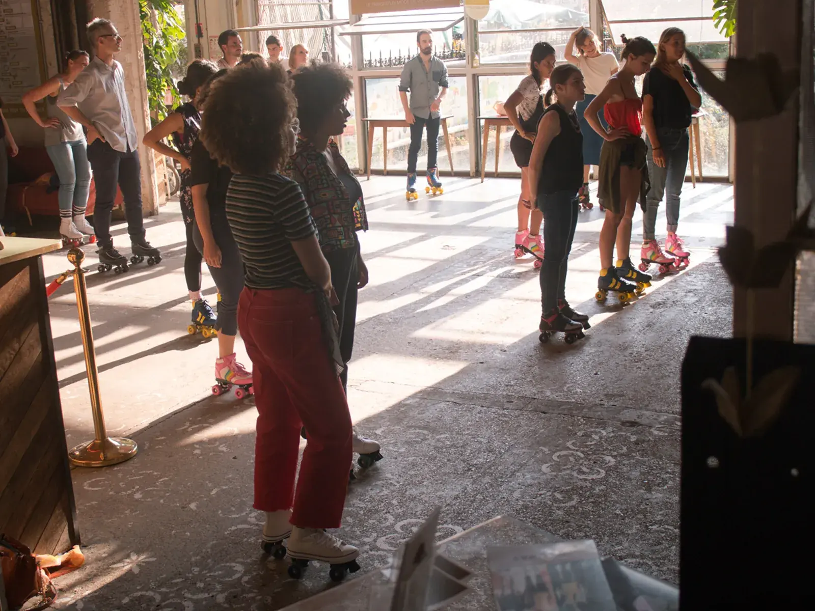 group of people wearing roller skates and skating together  9