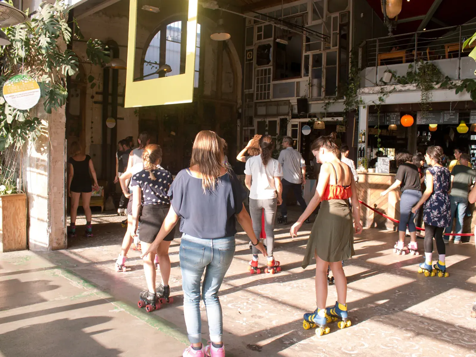 group of people wearing roller skates and skating together  8