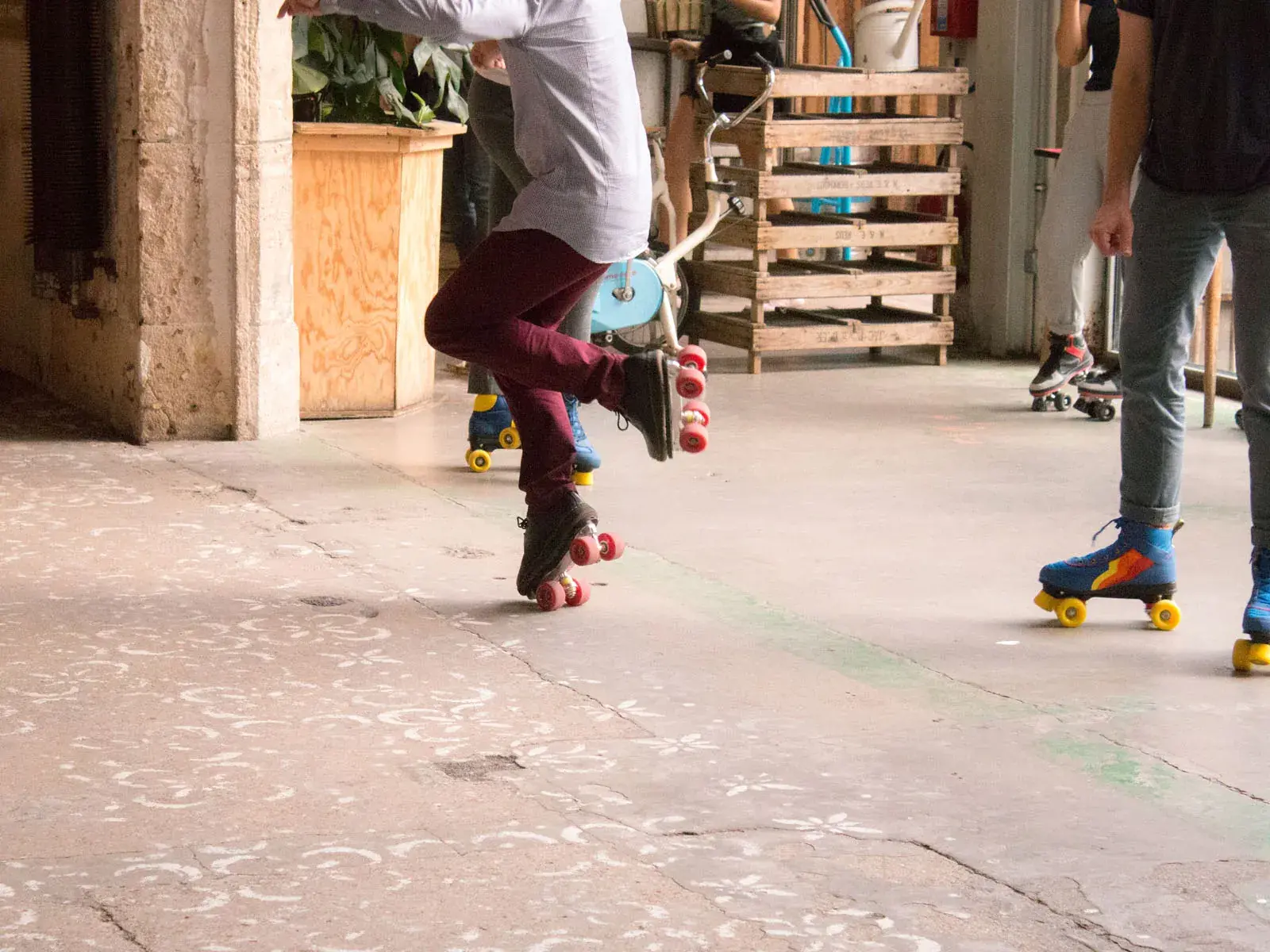 group of people wearing roller skates and skating together 5