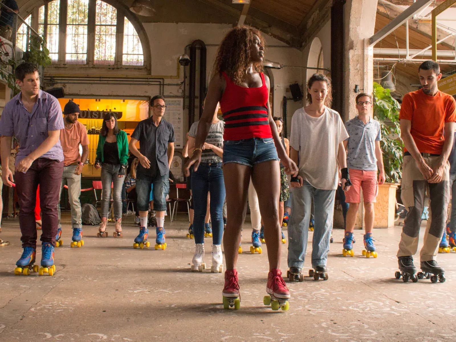 group of people wearing roller skates and skating together  6