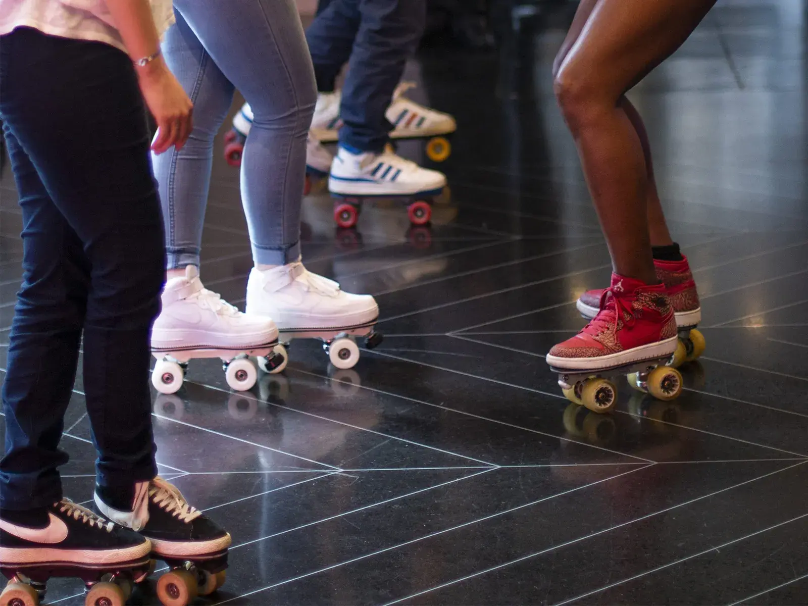 people wearing roller skates by flaneurz