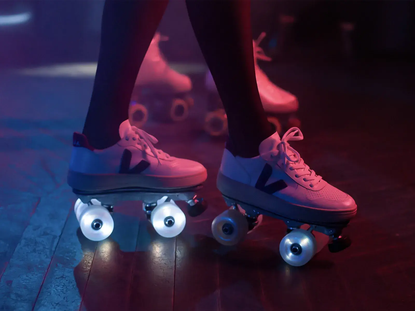 a woman wearing white veja transformed into skating sneaker by flaneurz 