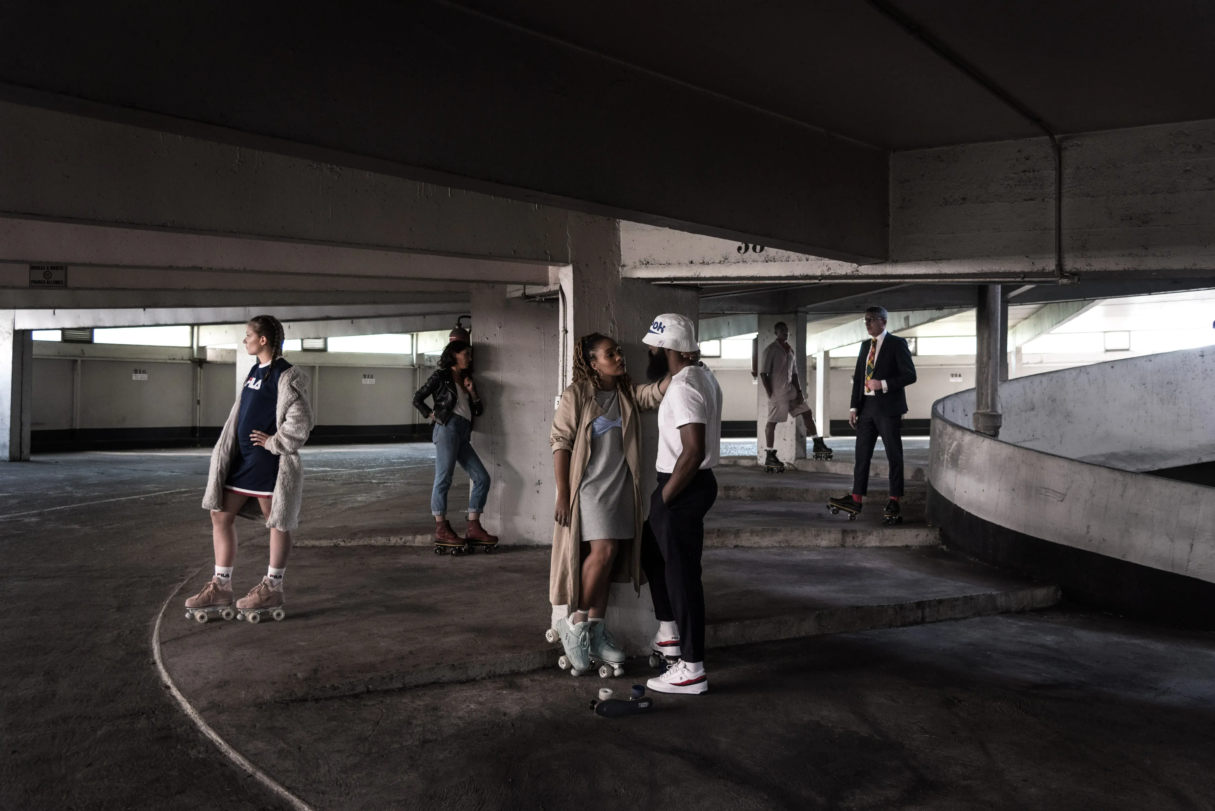 a group of people wearing roller skates
