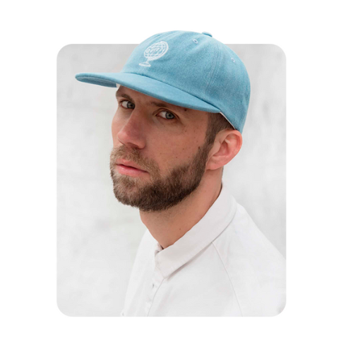 Photo de Florian co founder florian the co-founder of slades by flaneurz wearing a blue hat