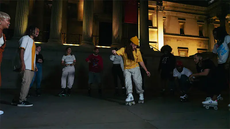 a group of people enjoying their roller skates