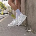 chaussures seules slades blanches profil.webp