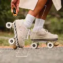 mens-roller-skates-veja-veja-v-10-sable-parme-flaneurz-lifestyle-roller-skates.webp